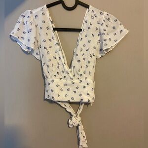 floral tie behind top